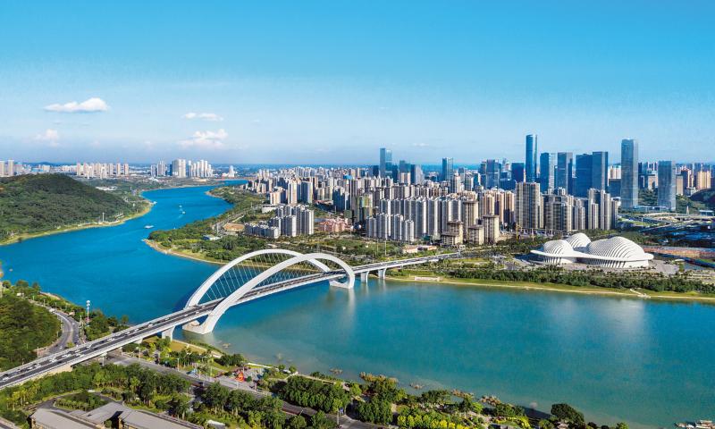 A panoramic view of the Nanning Bridge spanning a river in the capital of Guangxi .jpeg